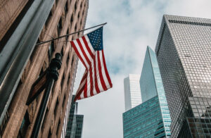 An American flag hanging from a building in NYC 