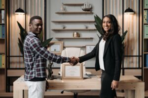 a man shaking hands with an immigration lawyer