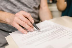 a person reviewing paperwork