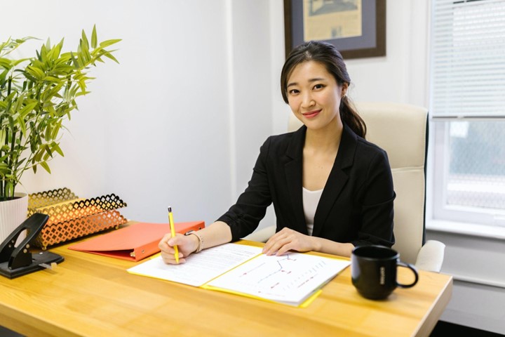 a woman working at a desk