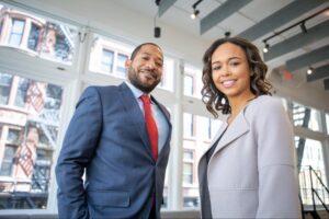 a man and woman in formal attire