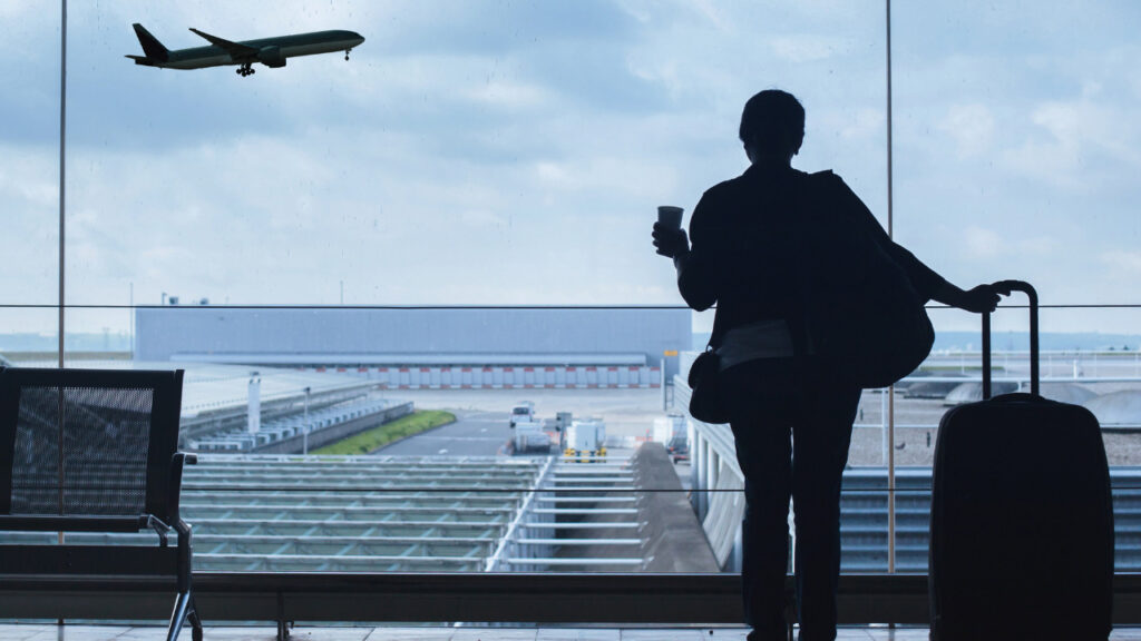 a man standing at the airport